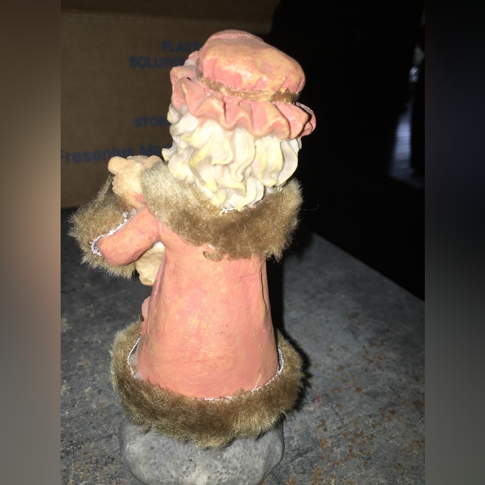 Beautiful vintage porcelain figurine has fur around her coat great decor
